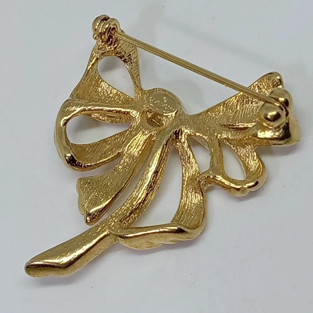 * vintage Givenchy gold tone ribbon bow pin brooch
